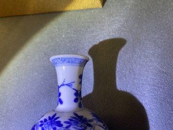 Five Chinese mostly blue and white vases, Kangxi